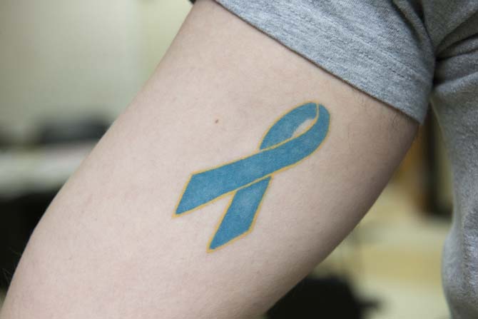 "My ovarian cancer ribbon was the result of months of consideration punctuated by a drunken spring break in Gulf Shores. My grandmother, one of the two women who raised me, lived five years after her initial prognosis of six months. My mother looked on the verge of tears when I showed her, and still so when I explained, for a different reason." - Alex Cassara, Deputy Sports Editor
 