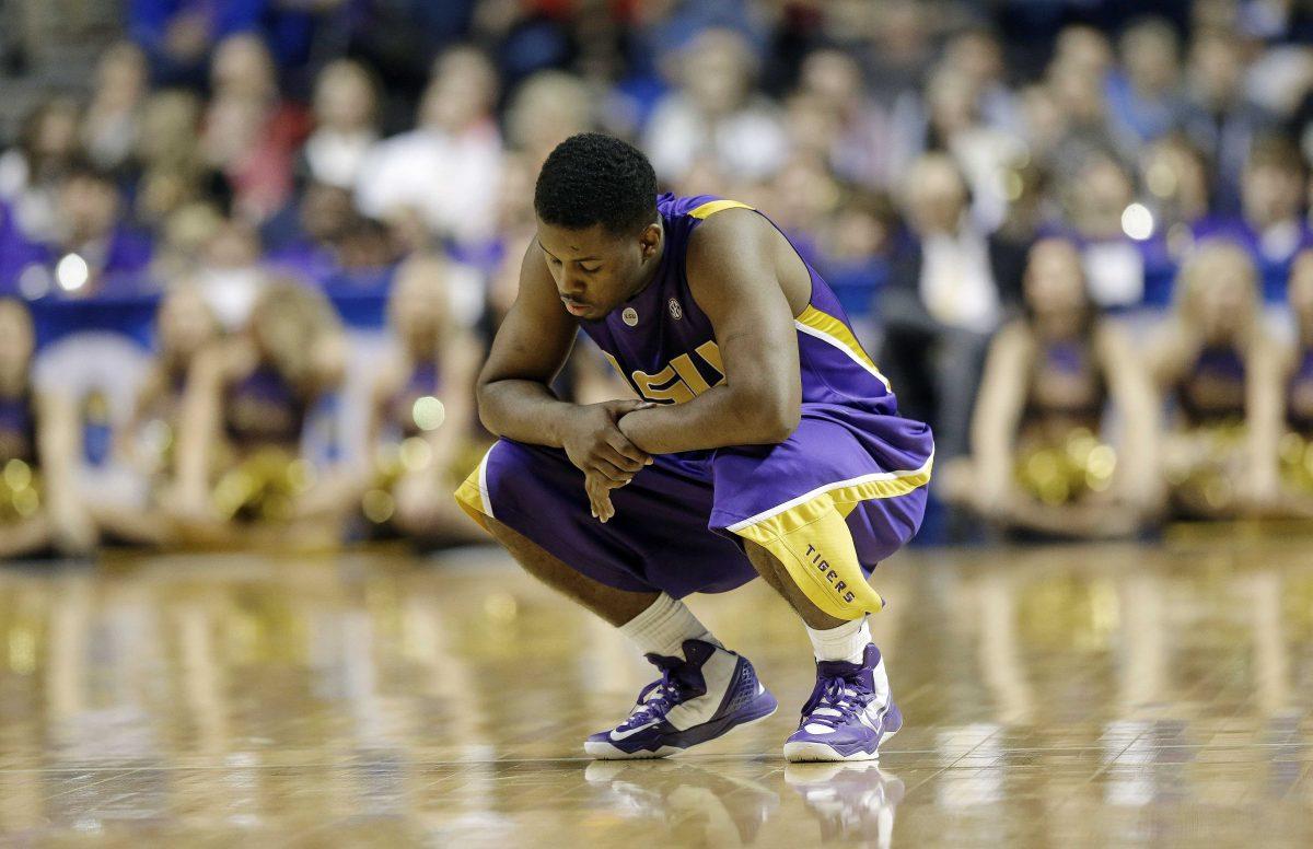 LSU guard Andre Stringer (10) reacts after losing 80-58 in an NCAA college basketball game against Florida at the Southeastern Conference tournament, Friday, March 15, 2013, in Nashville, Tenn. (AP Photo/John Bazemore)