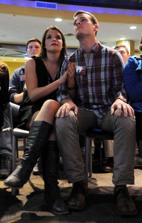 Kaitlin Tork&#233; (left) and T Graham S. Howell (right) of Impact LSU wait for Student Government election results March 13.
 
