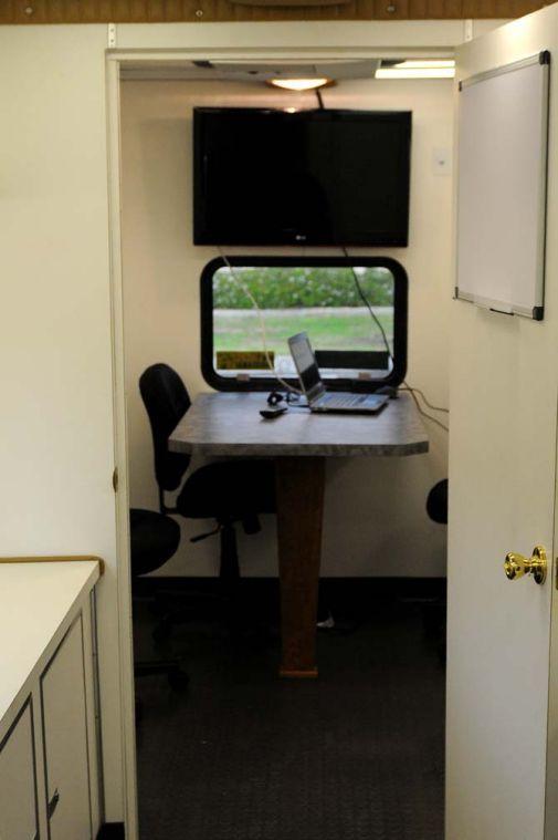 Chairs, a table, and a TV monitor are located in the back of the newly renovated LSU PD mobile command Tuesday, March 5, 2013.
 