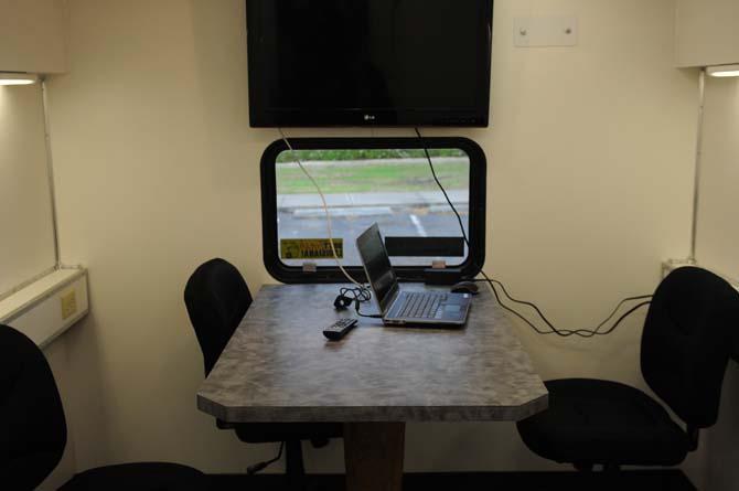 Chairs, a table, and a TV monitor are located in the back of the newly renovated LSU PD mobile command Tuesday, March 5, 2013.
 