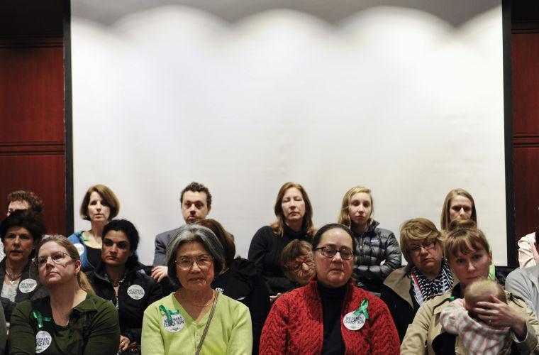 Supporters of gun control attend a Connecticut Against Gun Violence meeting at the Legislative Office Building in Hartford, Conn., Wednesday, March 13, 2013. Both sides of the gun control issue are increasing pressure on Connecticut lawmakers who are close to voting on changes to state law stemming from the shooting deaths of 20 children and six educators at Sandy Hook Elementary School in Newtown. (AP Photo/Jessica Hill)
 