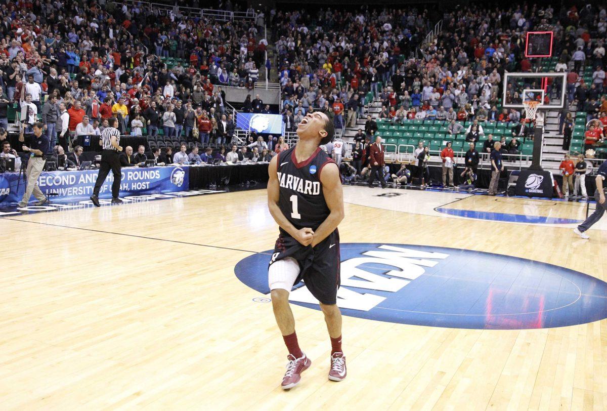 Harvard's Siyani Chambers (1) celebrates after defeating New Mexico 68-62 during a second-round game in the NCAA college basketball tournament in Salt Lake City Thursday, March 21, 2013. (AP Photo/Rick Bowmer)