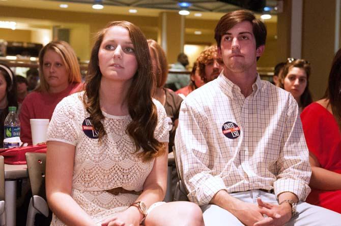 Taylor Parks (left) and John Woodard (right) of Unite LSU wait for Student Government election results on March 14.
 