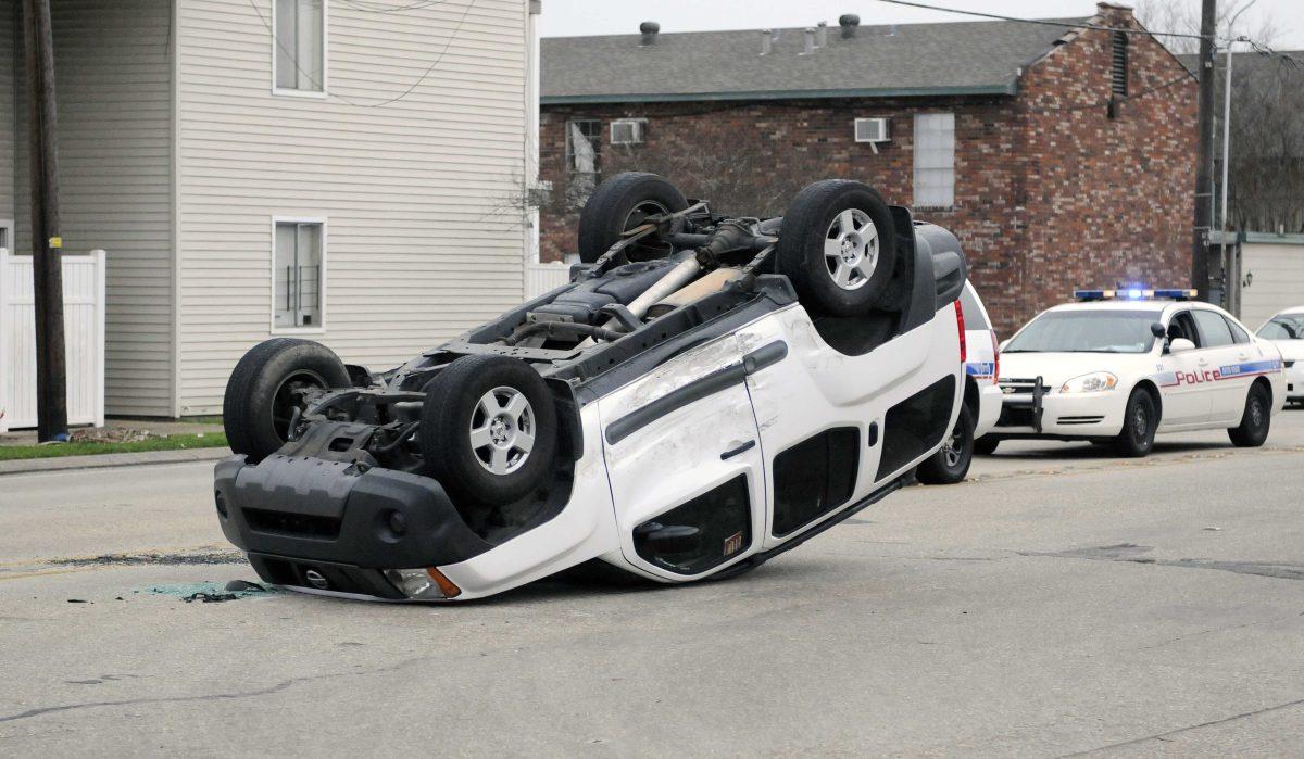 A flipped Nissan XTerra rests at West Parker Boulevard and Burbank Drive on Feb. 6, 2013.