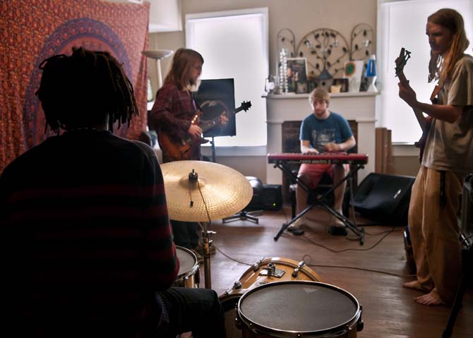 The band Trailer Hounds play together Sunday, March 24, 2013 during a band practice at a friend's apartment on E. State Street.
 