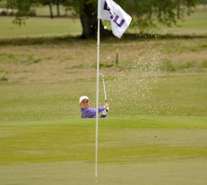 LSU junior Ali Lucas makes a big swing Sunday, March 24, 2013 during her last hole of her game at the University Club golf course.
 