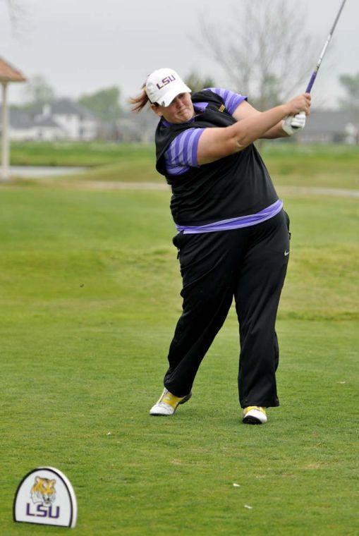 LSU senior Katrina Hegge strikes the ball Sunday, March 24, 2013 during the beginning of one of her holes at the University Club golf course.
 