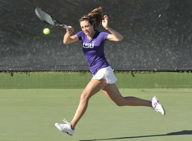 LSU senior Kaitlin Burns hits the ball Friday, March 15, 2013, during a match against Texas A&amp;M in W.T. "Dub" Robinson Stadium.