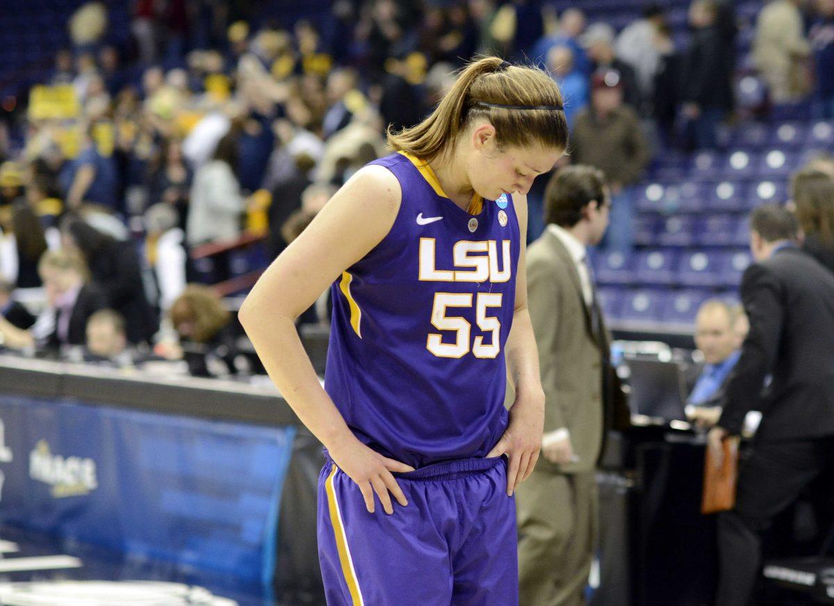 LSU's Theresa Plainsance (55) walks off the court after LSU's loss to California in a regional semifinal game of the NCAA women's college basketball tournament, Saturday March 30, 2013 in Spokane, Wash. California won 73-63. (AP Photo/Jed Conklin)