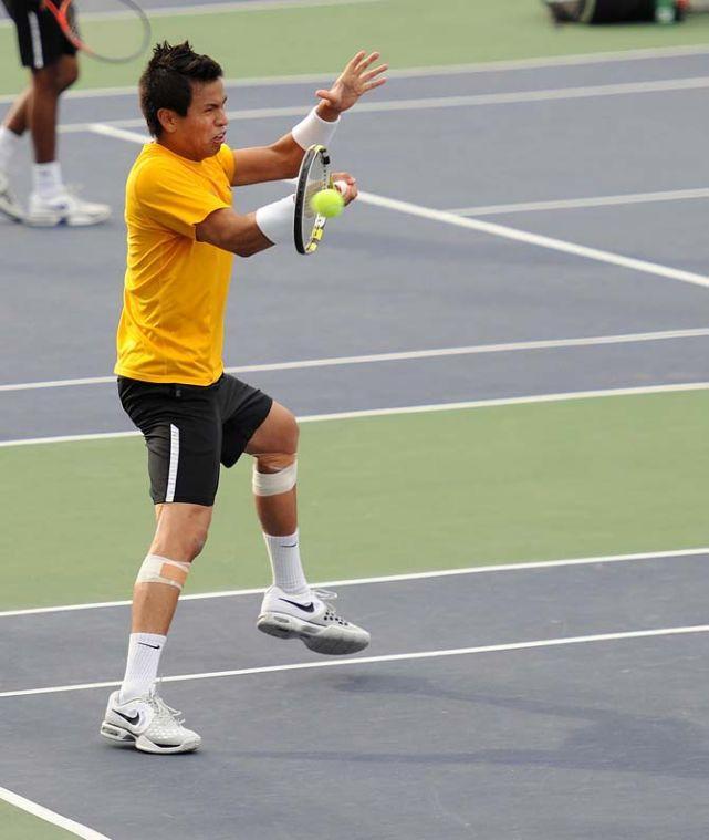 LSU senior Stefan Szacinski returns a serve Friday, March 8, 2013 during a doubles match against Auburn in W.T. "Dub" Robinson Stadium.
 