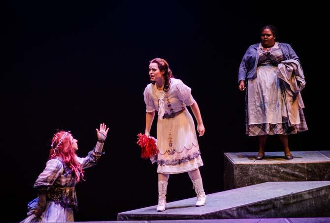 Rose Mannino (left, as Miss Jessel), Jene&#769;e Luquette (center, as Flora) and Zuly Inirio (right, as Mrs. Grose) perform &#8220;The Turn of the Screw,&#8221; which opens tonight.
 