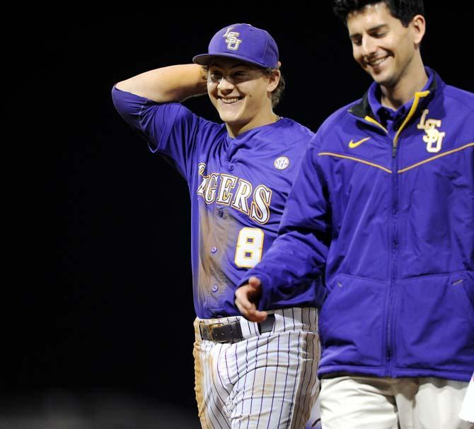 LSU senior infielder Mason Katz (8) walks off the field Saturday, March 9, 2013 after hitting two home runs during the Tigers' 8-4 victory against the Washington Huskies in Alex Box Stadium.
 