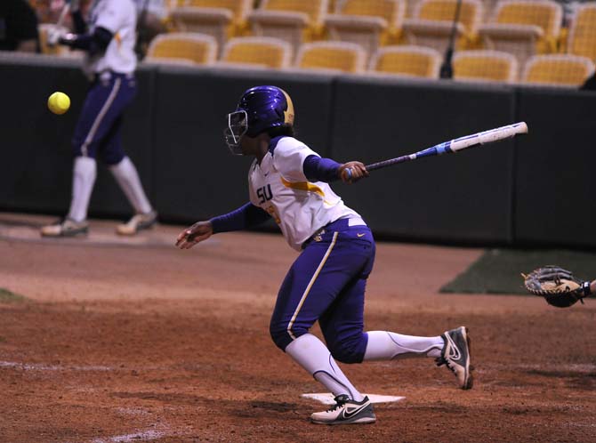 LSU freshman infielder Bianka Bell (27) hits the ball Tuesday, March 19, 2013, during the Tigers' game against Georgia Southern in Tiger Park.
 