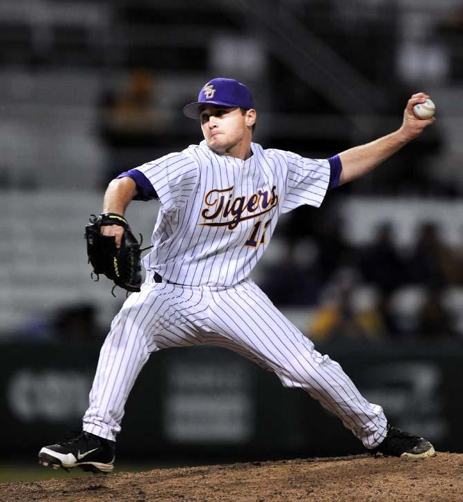 LSU freshman pitcher Hunter Devall (12) throws a ball March 6, 2013, during the Tigers' 10-2 victory against Sacred Heart at Alex Box Stadium.
 