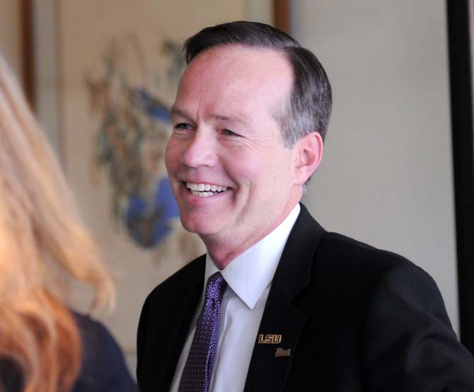 Newly elected LSU President F. King Alexander chats with reporters March 27, 2013, after the LSU Board of Supervisors unanimously voted to approve him for the position at a meeting in the LSU System building.
 