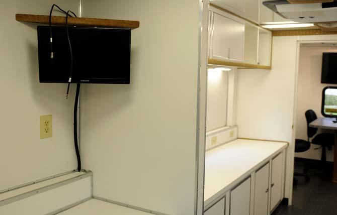 Shelves and a TV monitor line the inside of the newly renovated LSU PD mobile command Tuesday, March 5, 2013.
 