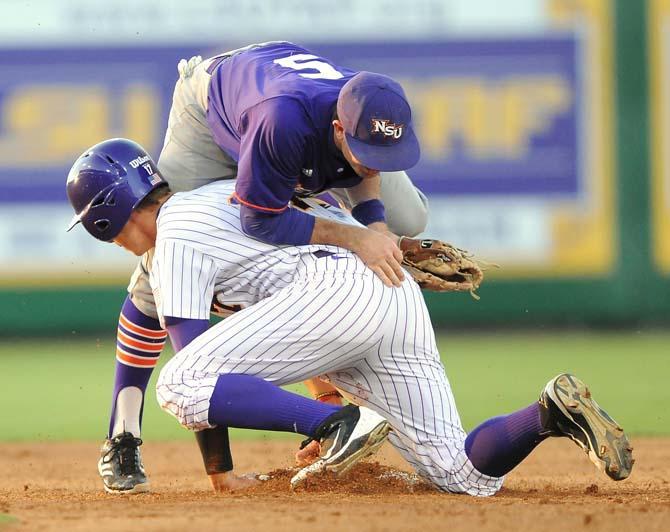 Tigers squeak out 2-1 victory against Demons after 13 innings