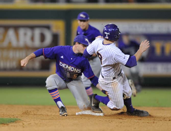 LSU senior infielder Mason Katz (8) slides into second base March 20, 2013, during the Tigers' 2-1 victory against Northwestern State University at Alex Box Stadium.
 