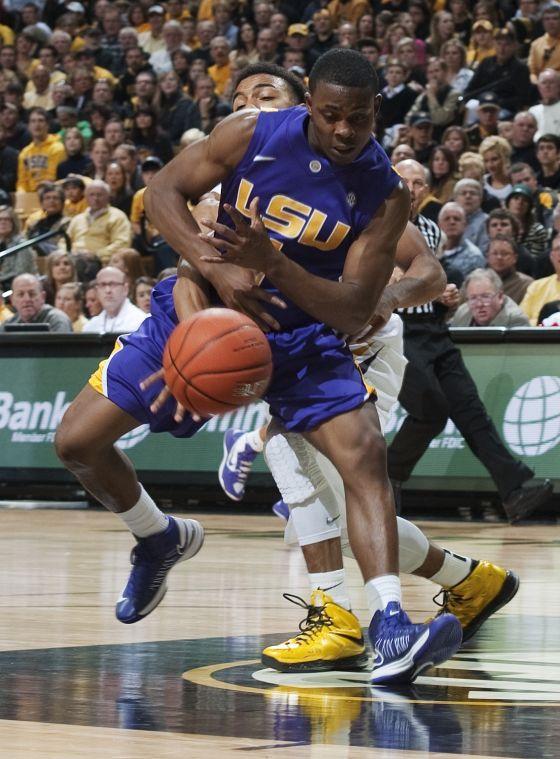 LSU's Anthony Hickey, right, has the ball knocked away by Missouri's Phil Pressey during the second half of an NCAA college basketball game Saturday, March 2, 2013, in Columbia, Mo. Missouri won the game 89-76. (AP Photo/L.G. Patterson)
 