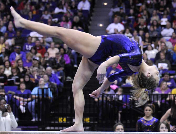 LSU sophomore all-around Jessie Jordan backflips on the balance beam March 1, 2013 during the Tigers' 197-196 win against Georgia in the PMAC.
 