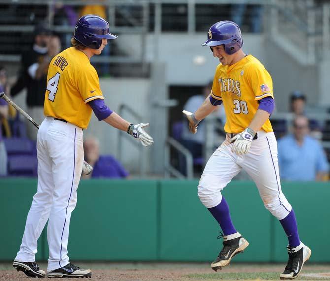 First five batters thrust Tigers to  top Washington