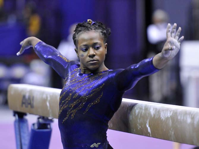 LSU sophomore all-around Lloimincia Hall prepares to start her balance beam routine Friday, March 1, 2013 during the Tigers' 197-196 win against Georgia in the PMAC. Hall scored a 9.65 on the beam.
 