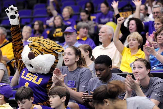 LSU junior forward Theresa Plaisance cheers with her team and fans while watching the Selection Show Monday, March 18, 2013 in the PMAC. The Tigers earned no. 6 sead in the NCAA tournament.
 