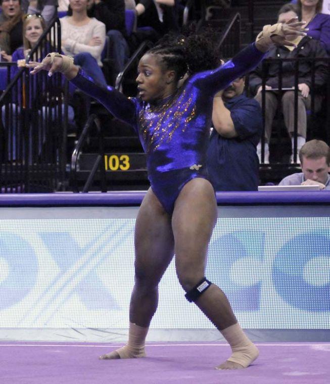 LSU sophomore all-around Lloimincia Hall dances during her floor routine March 1, 2013 in the Tigers' 197-196 win against Georiga in the PMAC. Hall scored her fourth 9.95 on her routine.
 