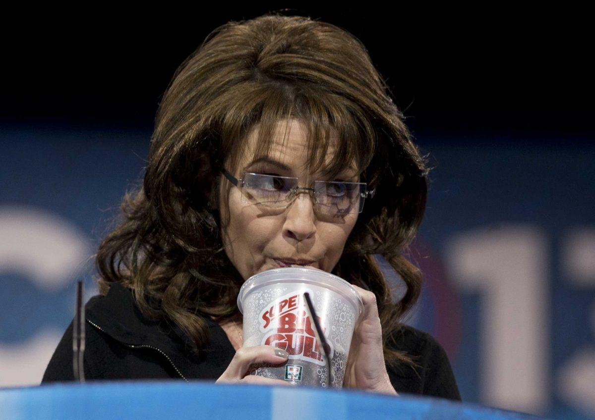 Former Alaska Gov. Sarah Palin drinks from a 7-Eleven Super Big Gulp on stage while speaking at the 40th annual Conservative Political Action Conference in National Harbor, Md., Saturday, March 16, 2013. Earlier in the week a New York judge struck down a ban proposed by New York Mayor Michael Bloomberg to end the sale of sugared sodas larger than 16 oz. (AP Photo/Carolyn Kaster)