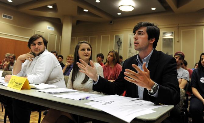 LSU finance junior John Woodard, Unite LSU's presidential candidate, answers a question for the Univerisity Court justices Saturday, March 16, 2013 for the Unite LSU vs Elections Board case in the Vieux Carre Room in the Student Union.
 