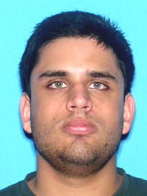 In this undated photograph released by the University of Central Florida in Orlando, Fla., shows shows James Seevakumaran. University of Central Florida police have identified Seevakumaran as the student that killed himself in a dorm at UCF in Orlando, Fla., early Monday March 18, 2013. Seevakumara was found with several fire arms and a homemade device in a backpack. The incident caused the evacuation of a dorm building. (AP Photo/Florida Highway Patrol)
 