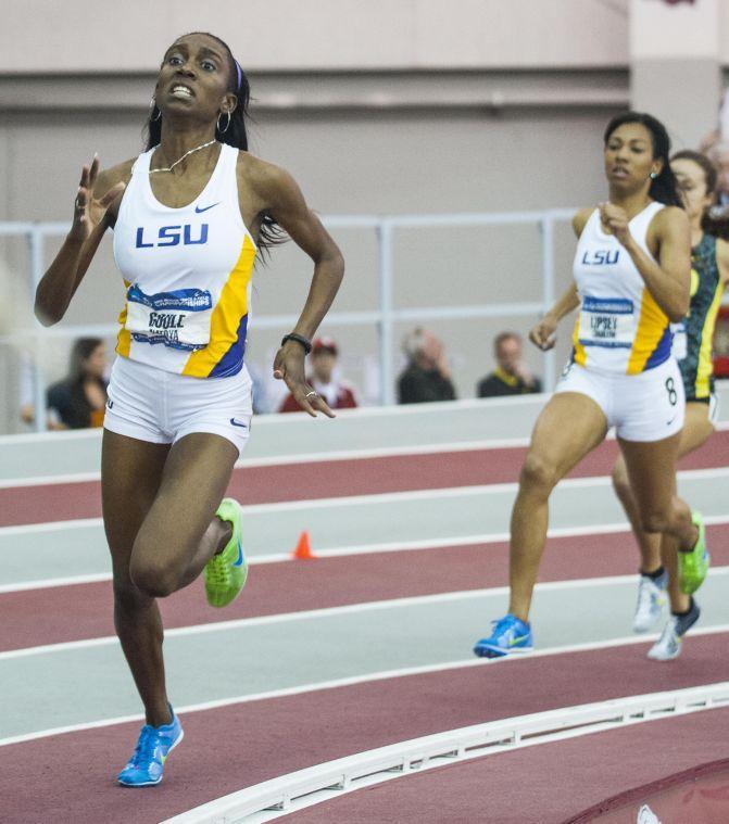 LSU's Natoya Goule, left front, pulls away from teammate Charlene Lipsey, front right, as Oregon's Laura Roesler, back right, follows during the 800-meter run during NCAA Division I Indoor Track and Field Championship in Fayetteville, Ark., Saturday, March 9, 2013. Goule won with a time of 2:02 minutes, Roesler finished second at 2:02.32 minutes and Lipsey finished third with a time of 2:02.47 minutes. (AP Photo/April L. Brown)
 