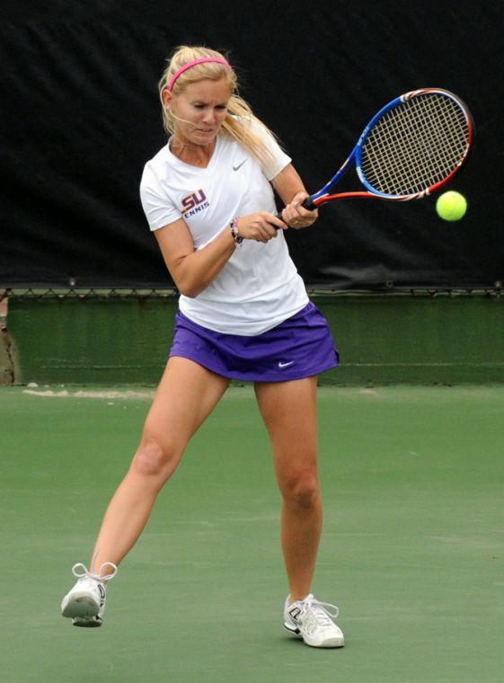 LSU junior Ariel Morton backhands the ball Saturday, Feb. 23 during the Tigers' singles match against the Nicholls State Colonels at W.T. "Dub" Robinson Tennis Stadium.