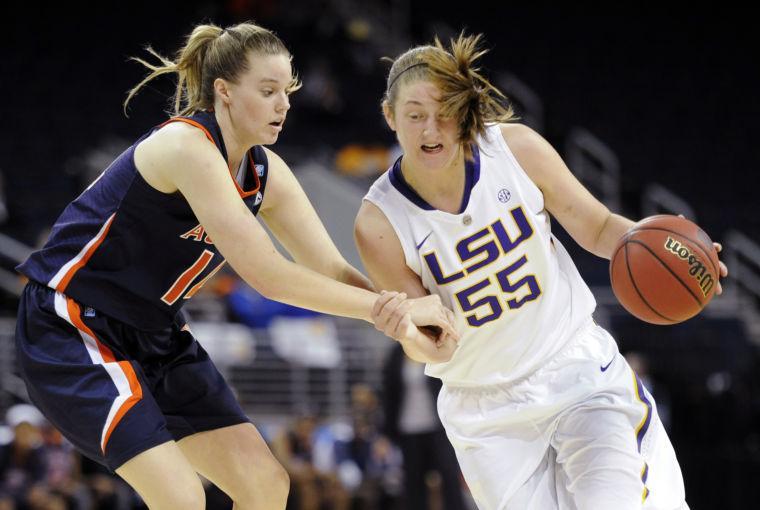 LSU forward Theresa Plaisance (55) is defended by Auburn's Blanche Alverson (14) during the second half of an NCAA college basketball game in the Southeastern Conference tournament, Thursday, March 7, 2013, in Duluth, Ga. LSU won 65-62. (AP Photo/John Amis)
 