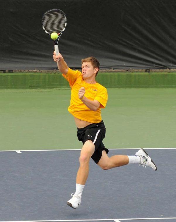 LSU sophomore Chris Simpson hits the ball Friday, March 8, 2013 during a doubles match against Auburn in W.T. "Dub" Robinson Stadium.
 