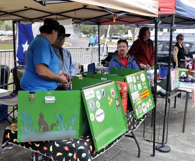 (Left to right) the Weltikol and Foley families, Palm Coast, FL and Galveston, TX natives, cook chili during the chili cookoff located at Parker Coliseum Saturday, March 9, 2013.
 