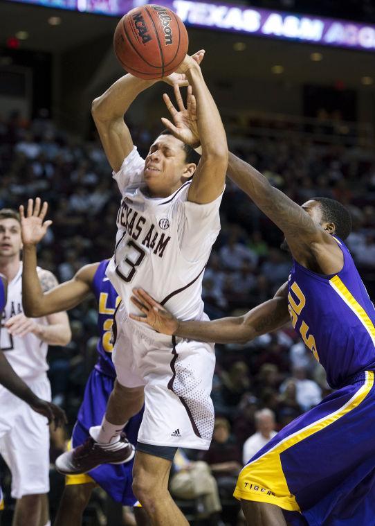 Texas A&amp;M's Jordan Green is stripped of the ball by LSU's Shavon Coleman during the first half of an NCAA college basketball game in College Station, Texas on Wednesday, March 6, 2013. (AP Photo/Bryan-College Station Eagle, Stuart Villanueva)
 