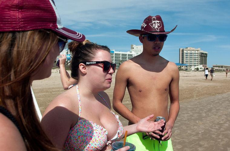 Texas A&amp;M students Kirsten Stokes, Lauren Taylor and Josh Vasquez talk about their spring break experience so far on Tuesday, March 12, 2013 at South Padre Island, Texas. (AP Photo/The Brownsville Herald, Paul Chouy)
 