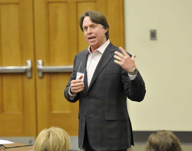 Mississippi-born chef John Besh speaks to a crowd about reclaiming Louisiana's food culture Thursday, March 14, 2013, in the Energy, Coast and Environment Building.
 