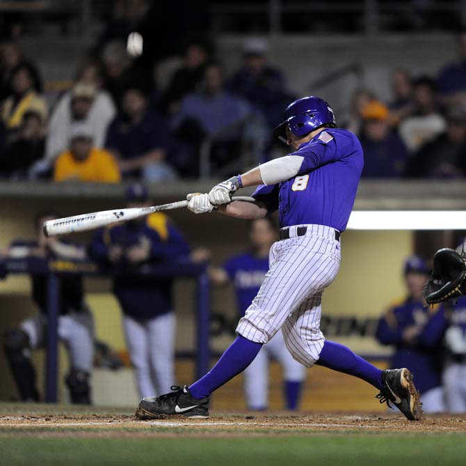 LSU senior infielder Mason Katz (8) swings at the ball Saturday, March 9, 2013 during the Tigers' 8-4 victory against the Washington Huskies in Alex Box Stadium.
 