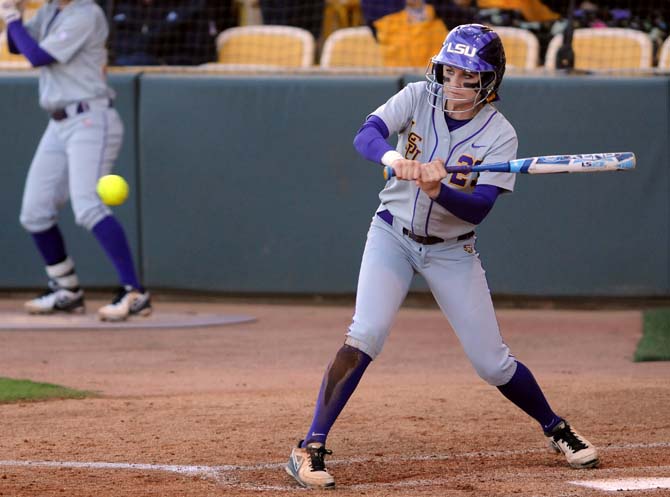 LSU junior utility player Jacee Blades (23) swings at a pitch March 13, 2013 during the Tigers' 8-0 win against Nicholls State in Tiger Park.
 