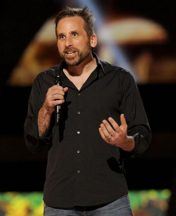 FILE - In this Dec. 7, 2012 file photo, Ken Levine, creative director and co-founder of Irrational Games, presents the world premiere of "BioShock Infinite" on stage at Spike's 10th Annual Video Game Awards at Sony Studios, in Culver City, Calif. Levine is hoping the companion character, Elizabeth, provides a new depth to "Infinite," one that wasn't reached in the original "BioShock," whose voiceless protagonist didn't have a sidekick. It's been a daring and daunting endeavor for the game's makers, especially considering Elizabeth was originally envisioned as a completely mute and scripted character. (Photo by Chris Pizzello/Invision/AP, File)
 