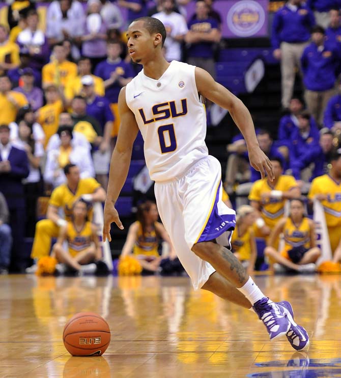 LSU senior guard Charles Carmouche (0) dribbles March 9, 2013 during the Tigers' 67-81 loss to Ole Miss in the PMAC.
 