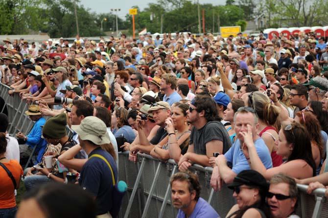 A crowd gathers to watch Band of Horses play Friday, April 26, 2013 at the New Orleans Jazz &amp; Heritage Festival on the Fair Grounds Race Course.
 