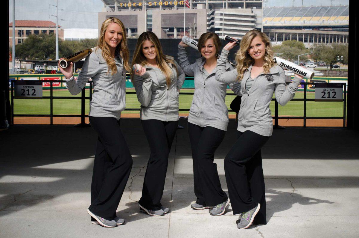 From left to right: Sidney Padgett, Yvonne Philipps, Claire Langlois and Courtney McGuffee are members of the LSU Baseball Bat Girls, a 21-person squad that assists the Tigers on and off the field.