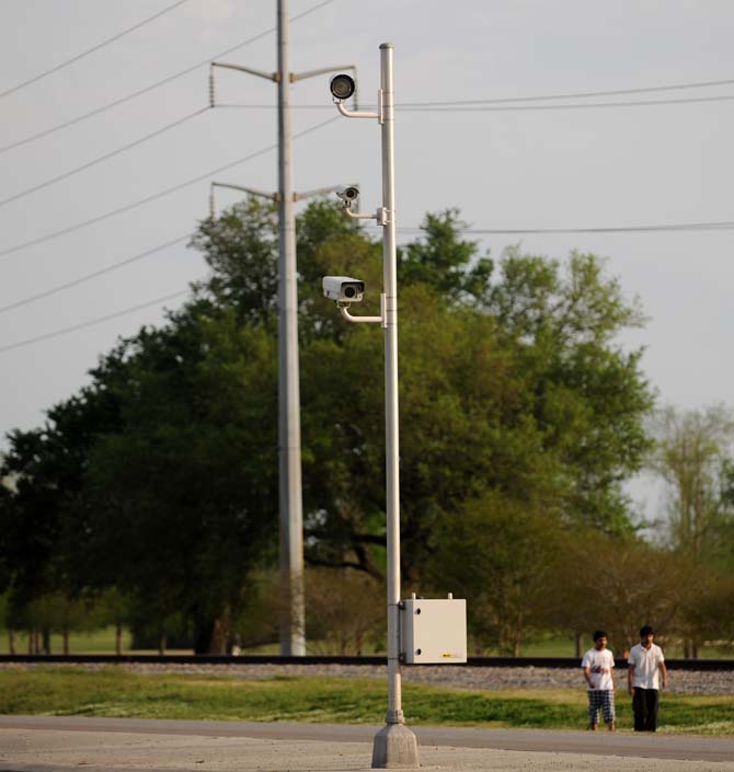 Traffic cameras watch the intersection at Nicholson and Burbank Tuesday, April 9, 2013.
 