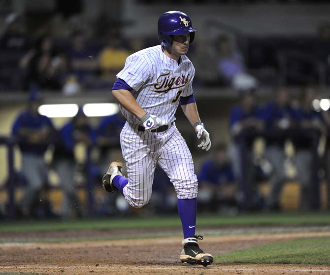 LSU freshman infielder Alex Bregman runs to first base Tuesday, April 30, 2013, during the Tigers' 7-3 win against the MSU Cowboys.
 