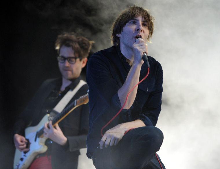 Laurent Brancowitz, left, and Thomas Mars of the musical group Phoenix perform at the second weekend of the 2013 Coachella Valley Music and Arts Festival at the Empire Polo Club on Saturday, April 20, 2013 in Indio, Calif. (Photo by John Shearer/Invision/AP)
 