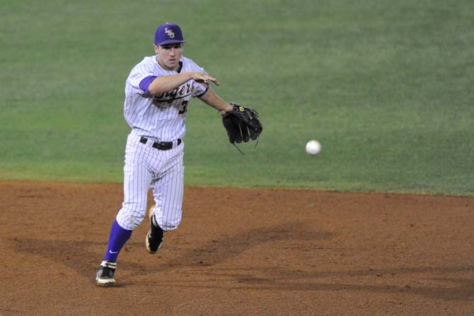 LSU freshman outfileder Mark Laird throws the ball Tuesday, April 30, 2013, during the Tigers' 7-3 win against the MSU Cowboys.
 